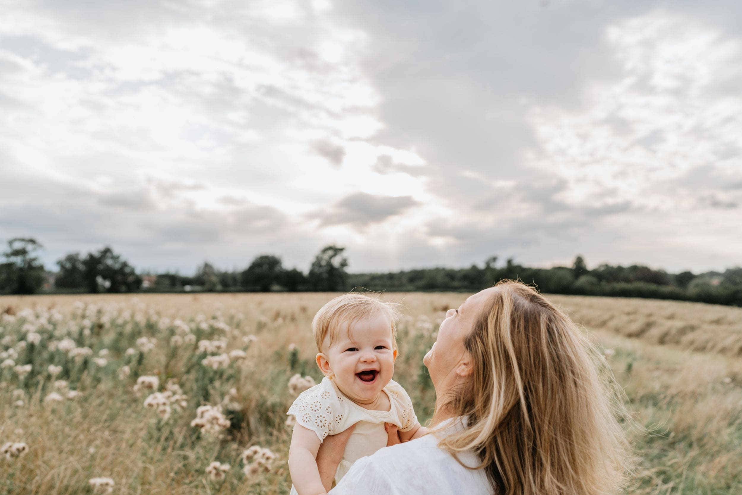 Beautiful family photography of a mother and her baby in an outdoor photoshoot in spring by Ipswich family photographer